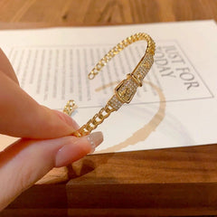 Close-up of the clasp and charm details on the Belt Buckle Bracelets