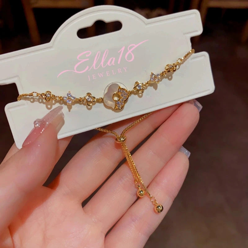 Close-up of the clasp and charm details on the Four-Leaf Flower Bracelet