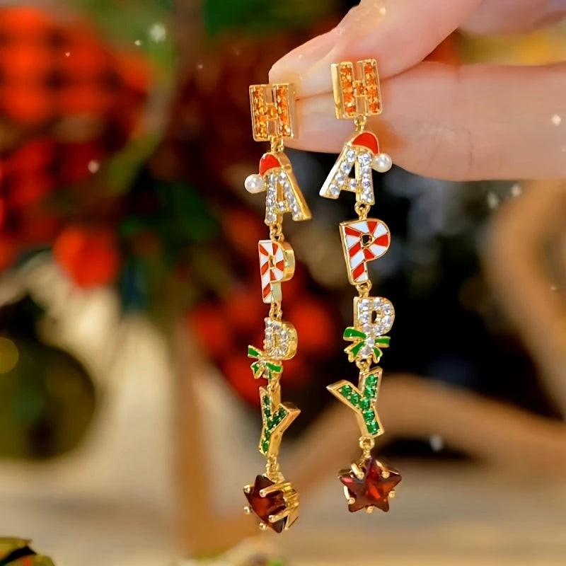 Model showcasing the dangle and style of the 14K Gold-plated Happy Christmas Diamond Zircon Letter Tassel Earrings