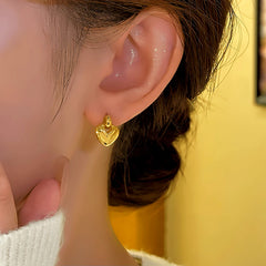 Angled view of the 14K Gold-plated Heart-Design Earrings