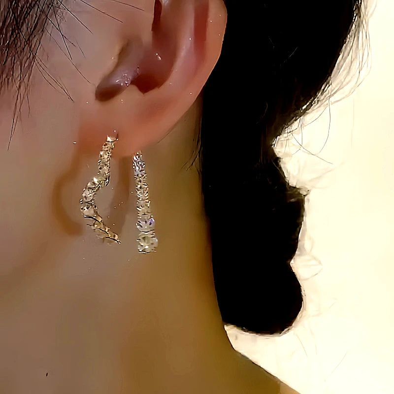 Angled view of the 14K Gold-plated Heart-Design Earrings