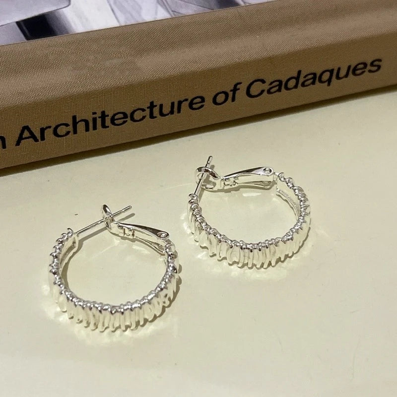 Angled view of the 14K Gold-plated Hoop Earrings