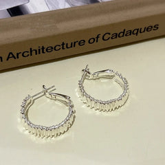 Angled view of the 14K Gold-plated Hoop Earrings