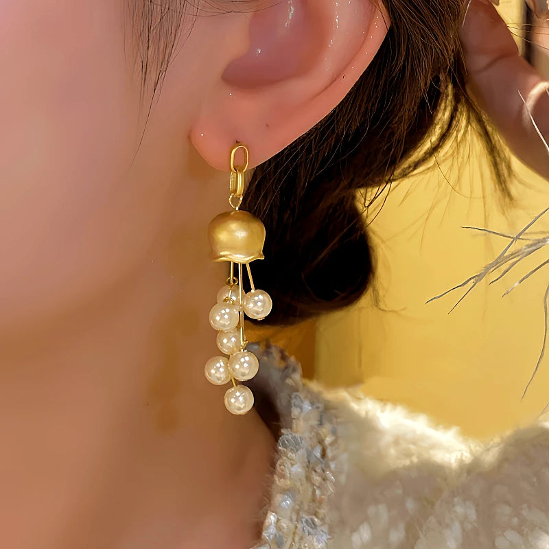 Close-up detail of the sparkling zircons and plating on the Beaded Tassel Earrings
