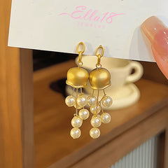 Angled view of the 14K Gold-plated Luxury Bead Tassel Earrings