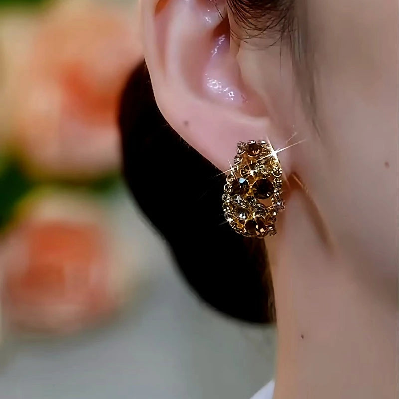 Close-up detail of the sparkling zircons and plating on the Brown Crystal Studs