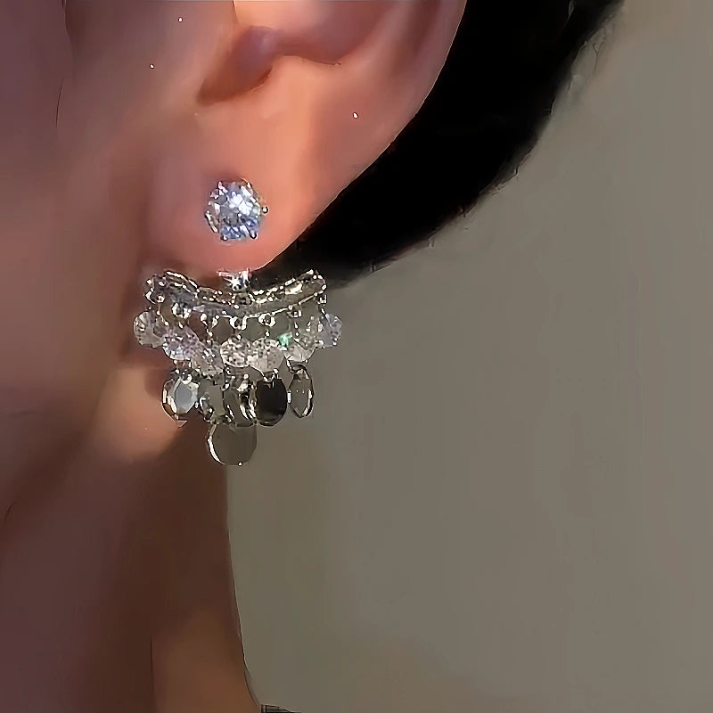 Close-up detail of the sparkling zircons and plating on the Bead Tassel Earrings