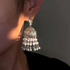 Close-up detail of the sparkling zircons and plating on the Pearl Tassel Earring
