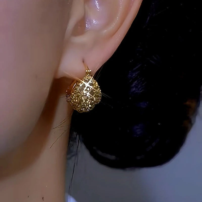 Close-up detail of the sparkling zircons and plating on the Diamond Drop Earrings