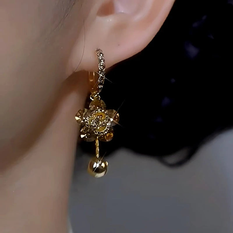 Close-up detail of the sparkling zircons and plating on the Diamond Flower Earrings