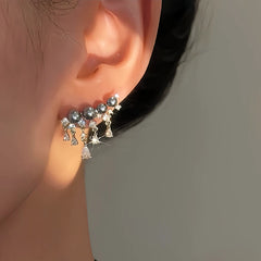 Close-up detail of the sparkling zircons and plating on the Gray Pearl Earrings