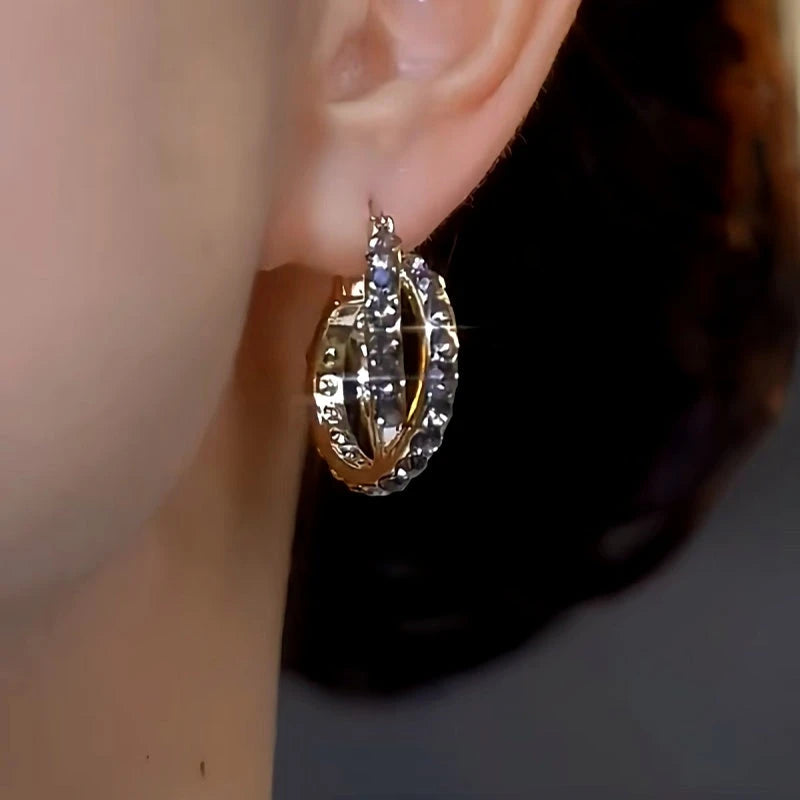 Close-up detail of the sparkling zircons and plating on the Silver Diamond Hoops
