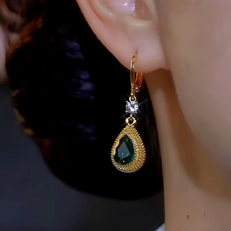 Close-up detail of the sparkling zircons and plating on the Green Crystal Earrings