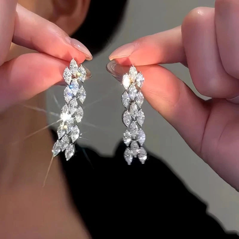 Close-up detail of the sparkling zircons and plating on the Zircon Tassel Earrings