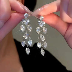 Close-up detail of the sparkling zircons and plating on the Zircon Tassel Earrings