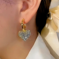 Close-up detail of the sparkling zircons and plating on the Rhinestone Heart Earrings