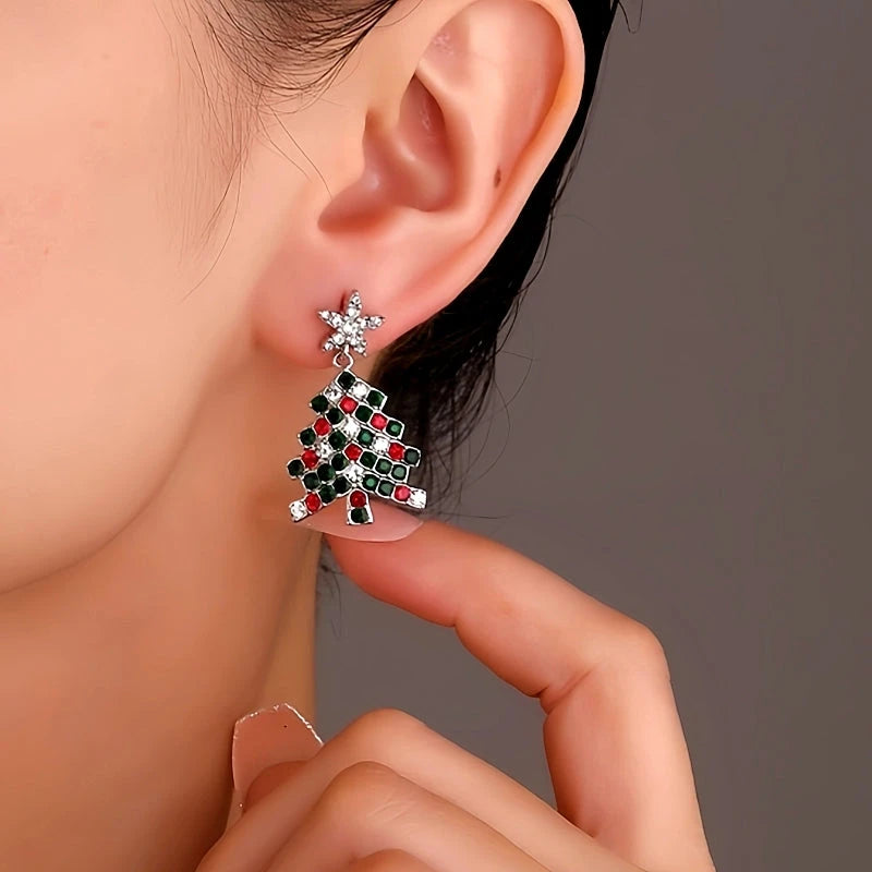 Model showcasing the dangle and style of the 14K Gold-plated Star Daimond Christmas Tree Earrings