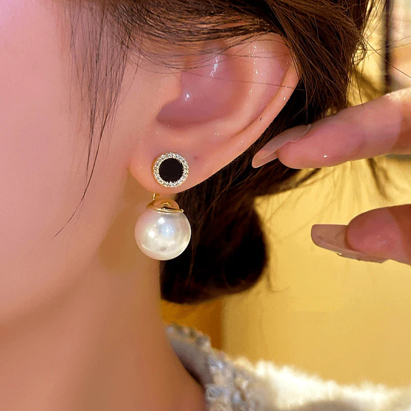 Close-up detail of the sparkling zircons and plating on the Bead Jacket Earrings