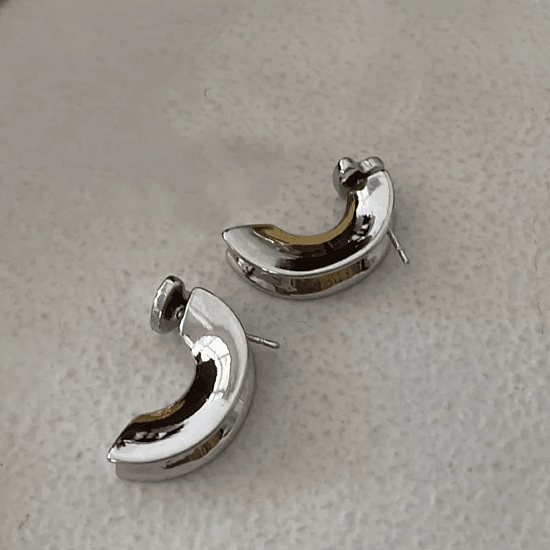 Close-up detail of the sparkling zircons and plating on the Heart Jacket Earrings