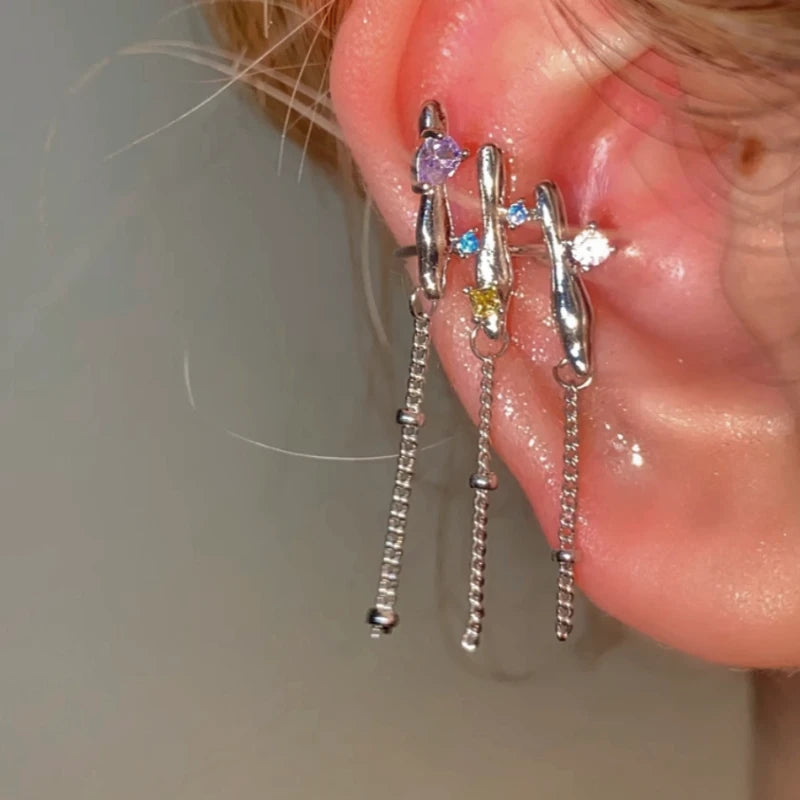 Model showcasing the dangle and style of the 14K Gold-plated Ultra-Fairy Colored Diamond Tassel Ear Cuffs