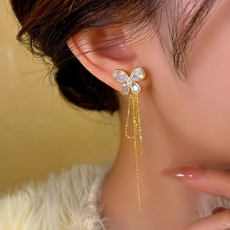 Close-up detail of the sparkling zircons and plating on the Butterfly Tassel Earrings