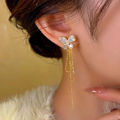 Close-up detail of the sparkling zircons and plating on the Butterfly Tassel Earrings