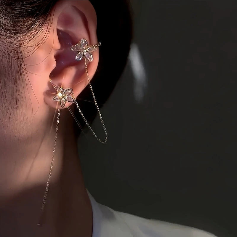 Model showcasing the dangle and style of the 14K Gold-plated Zircon Flower Ear Clip Earrings ( 1 PCS )