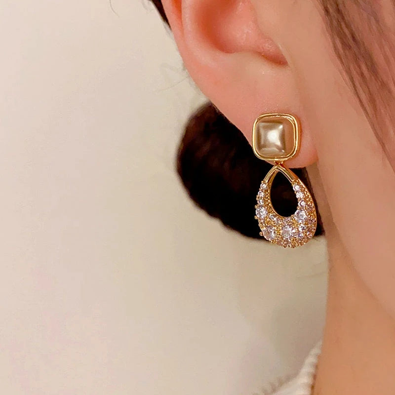 Close-up detail of the sparkling zircons and plating on the Geometric Pearl Drops