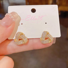 Angled view of the 14K Gold-plated Zircon Triangle Stud Earrings