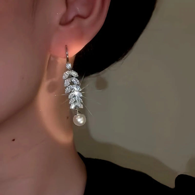 Close-up detail of the sparkling zircons and plating on the Tassel Ear Hooks