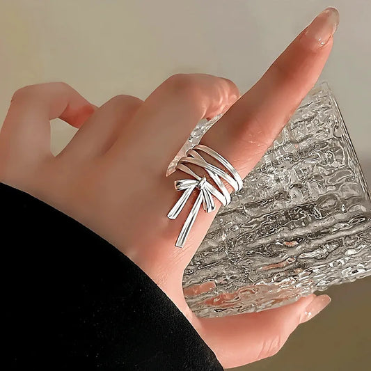 Dainty Gold Bow Ring | 14K Gold Plated Adjustable worn on the hand to show its beautiful fit and design