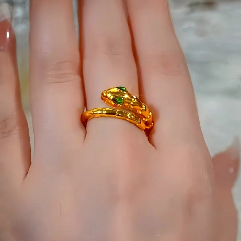 Emerald Eye Gold Snake Ring | 14K Gold Plated worn on the hand to show its beautiful fit and design