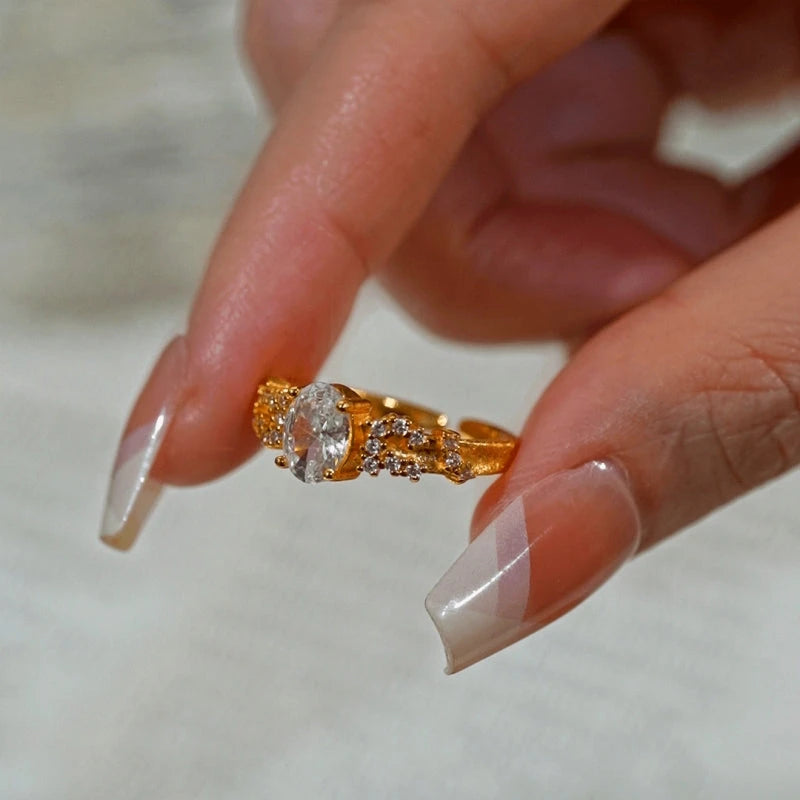 Close-up view of the gemstone and setting of the Celestial Gold Ring