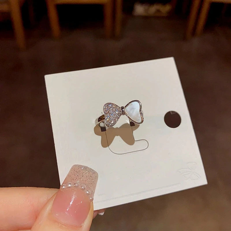 Close-up view of the gemstone and setting of the Gold Shell Ring