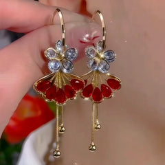 Angled view of the 14K Gold Plated Diamond-Studded Ginkgo Flower Earrings