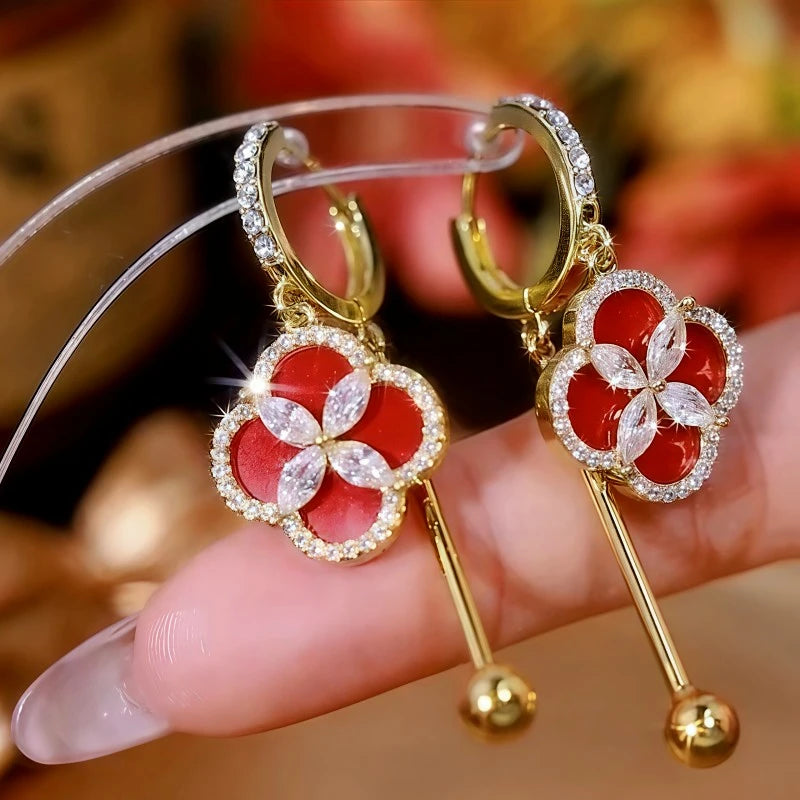 Angled view of the 14K Gold Plated Diamond Four-Leaf Clover Earrings