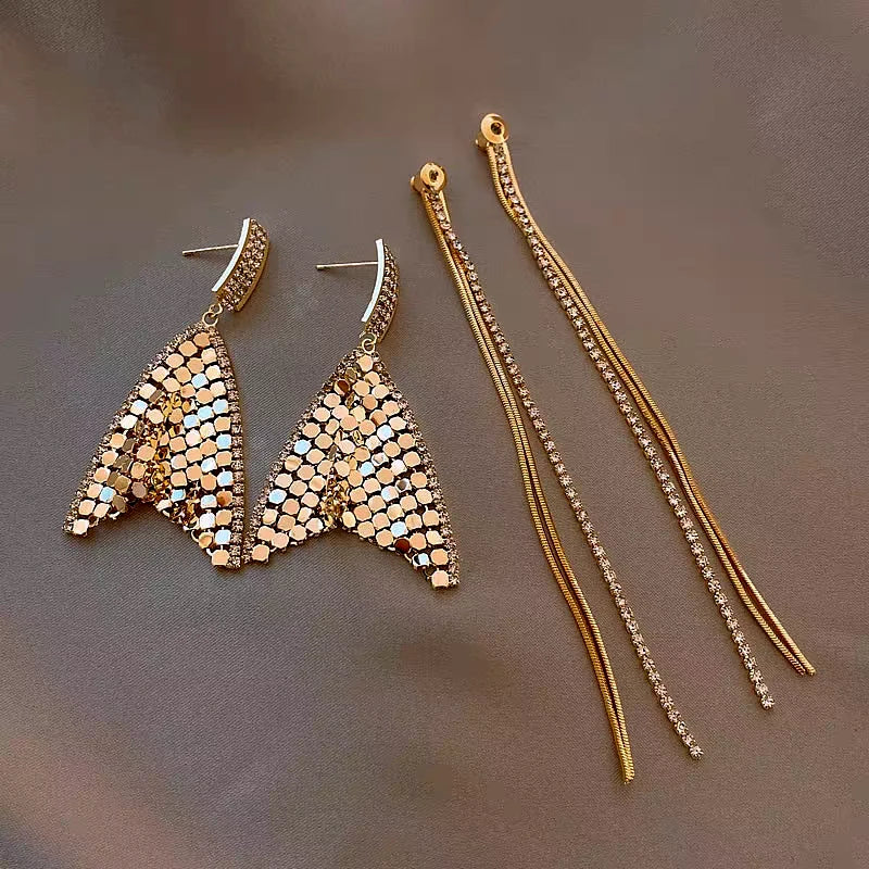 Angled view of the 14K Gold Plated Geometric Diamond Tassel Earrings