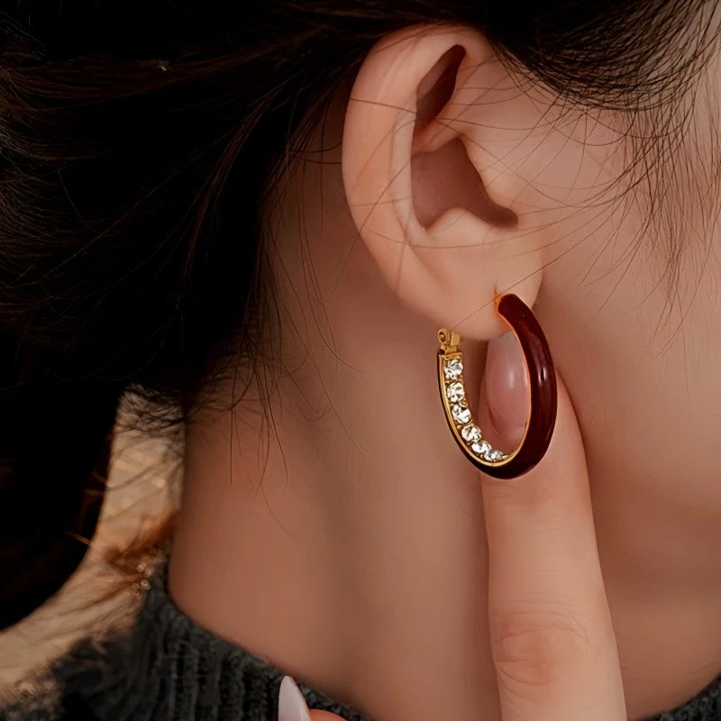 Angled view of the 14K Gold Plated Oil Drop Zircon Diamond Hoop Earrings