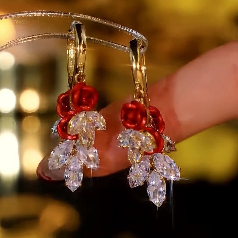 Close-up detail of the sparkling zircons and plating on the red drop earrings