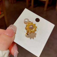 Sunflower Spinner Anxiety Ring | 14K Gold Plated worn on the hand to show its beautiful fit and design