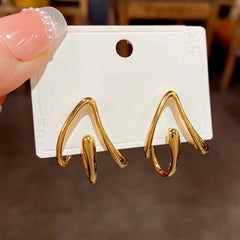 Angled view of the 14K Gold Plated Three-Dimensional Triangle Earrings