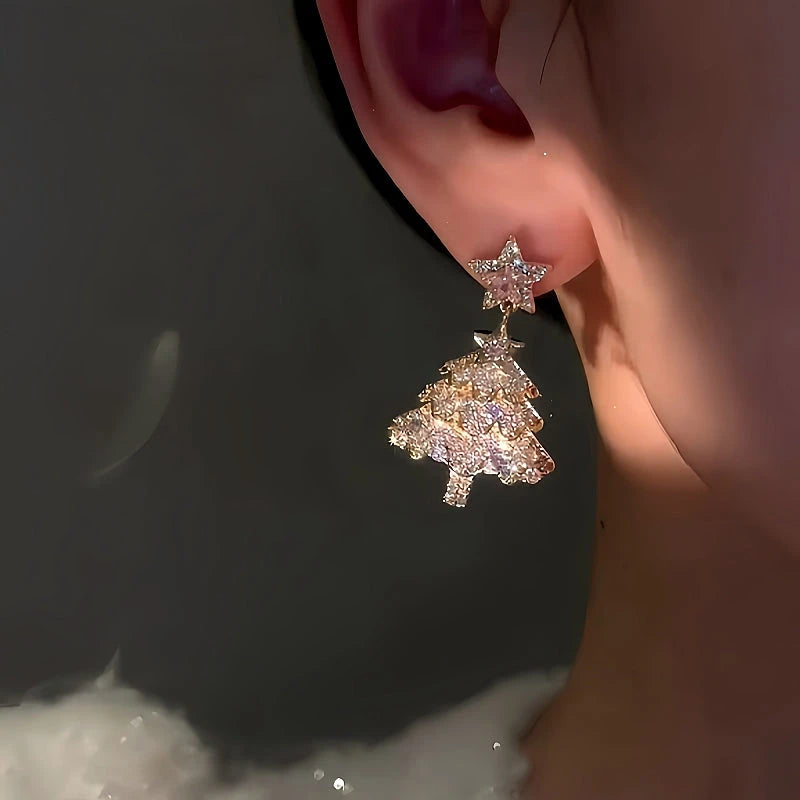 Model showcasing the dangle and style of the 14K Gold Plated Zircon Christmas Tree Earrings