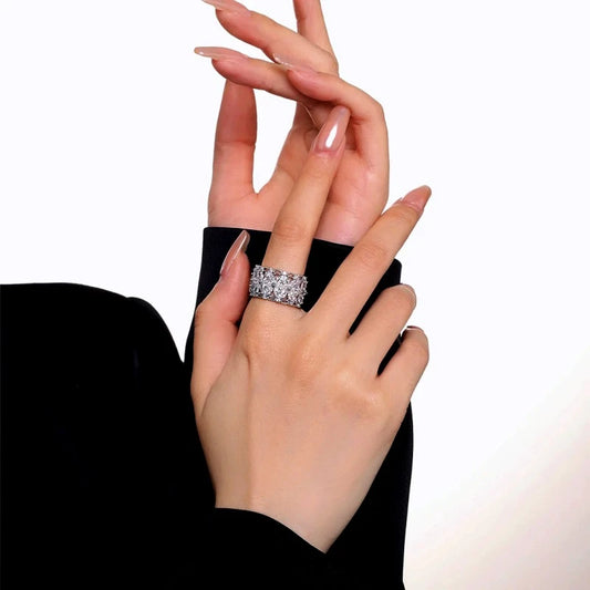 14K Gold Plated Zircon Flower Adjustable Rings worn on the hand to show its beautiful fit and design