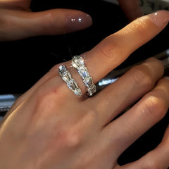 Close-up view of the gemstone and setting of the gold snake ring