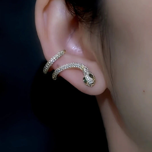 Model showcasing the dangle and style of the 14K Gold Plated Zodiac Snake Year Snake-Shaped Ear Bone Clip Earrings