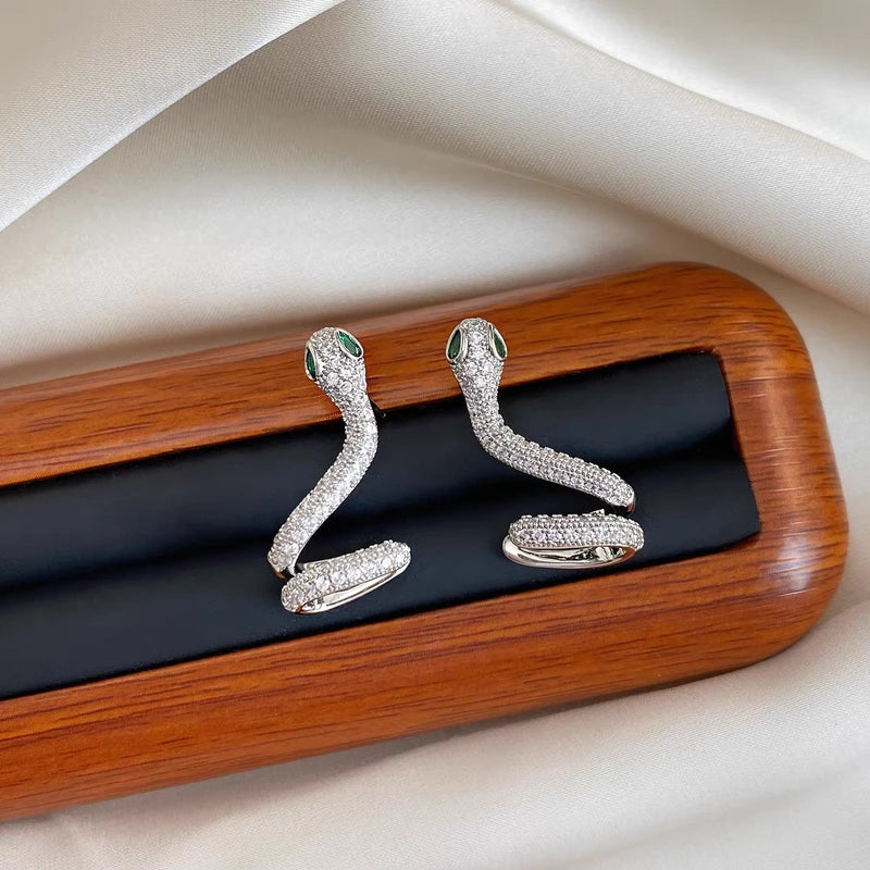 Perfect gold snake earrings for adding glamour to any outfit