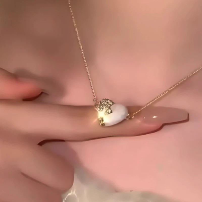 Highlighting the sparkle of the pendant on the Zircon Heart Necklace