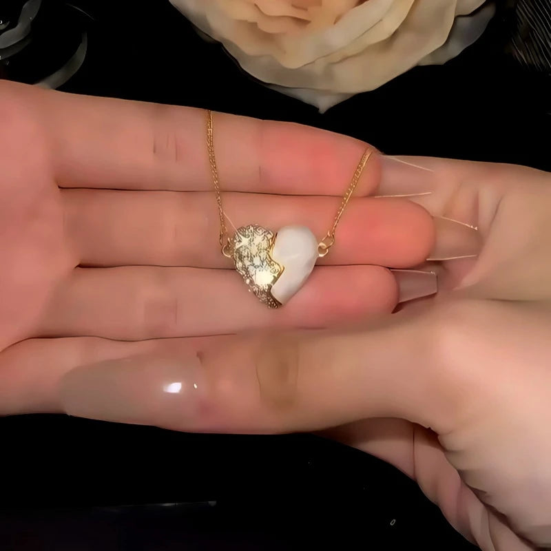 Another perspective of the 14K Gold-Plated Magnetic Zircon Diamond Heart Necklace