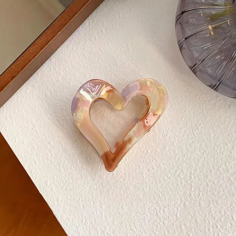 14K gold-plated Heart-Design Hair Clips shown for scale and size reference