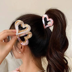 Detail of the color and pattern on the Pink Heart Hair Clips